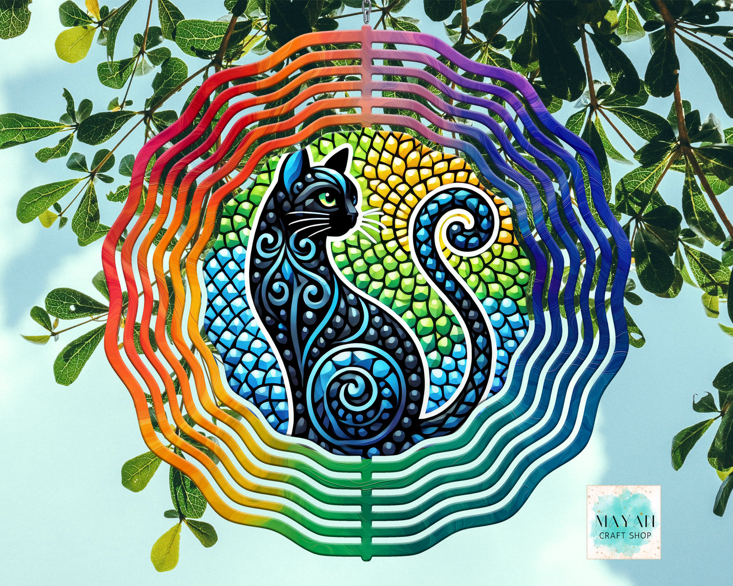 Colorful cat design with rainbow patterns against a natural background