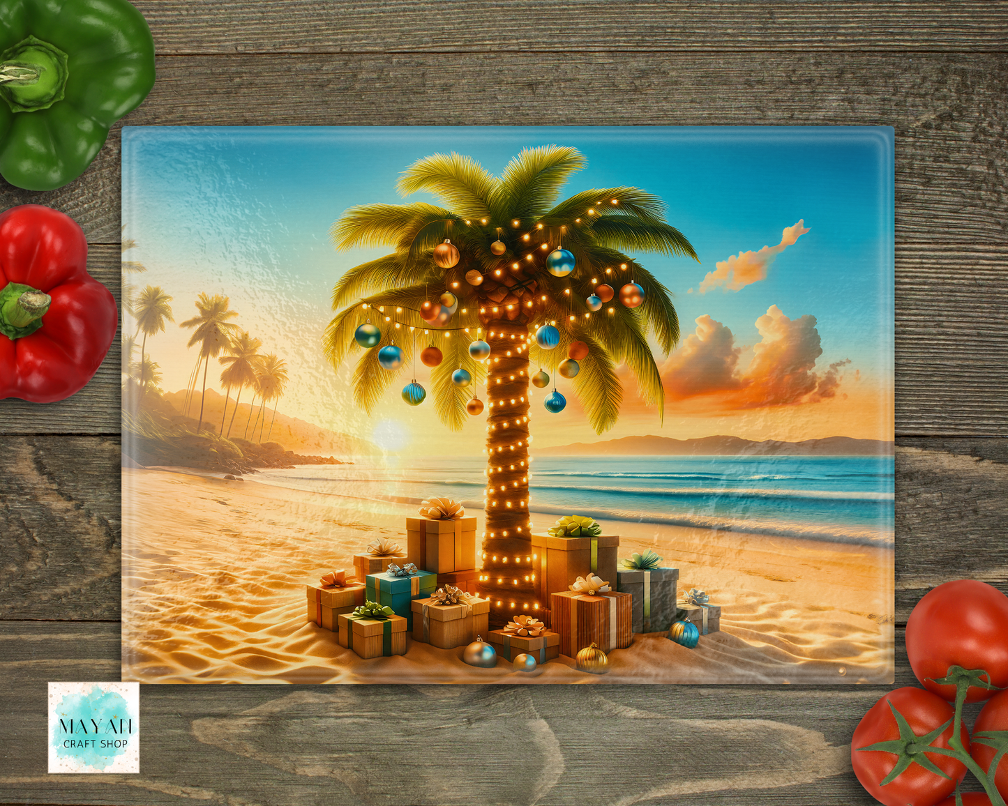 Decorative cutting board with a palm tree and presents on a beach at sunset, surrounded by vegetables on a wooden surface.