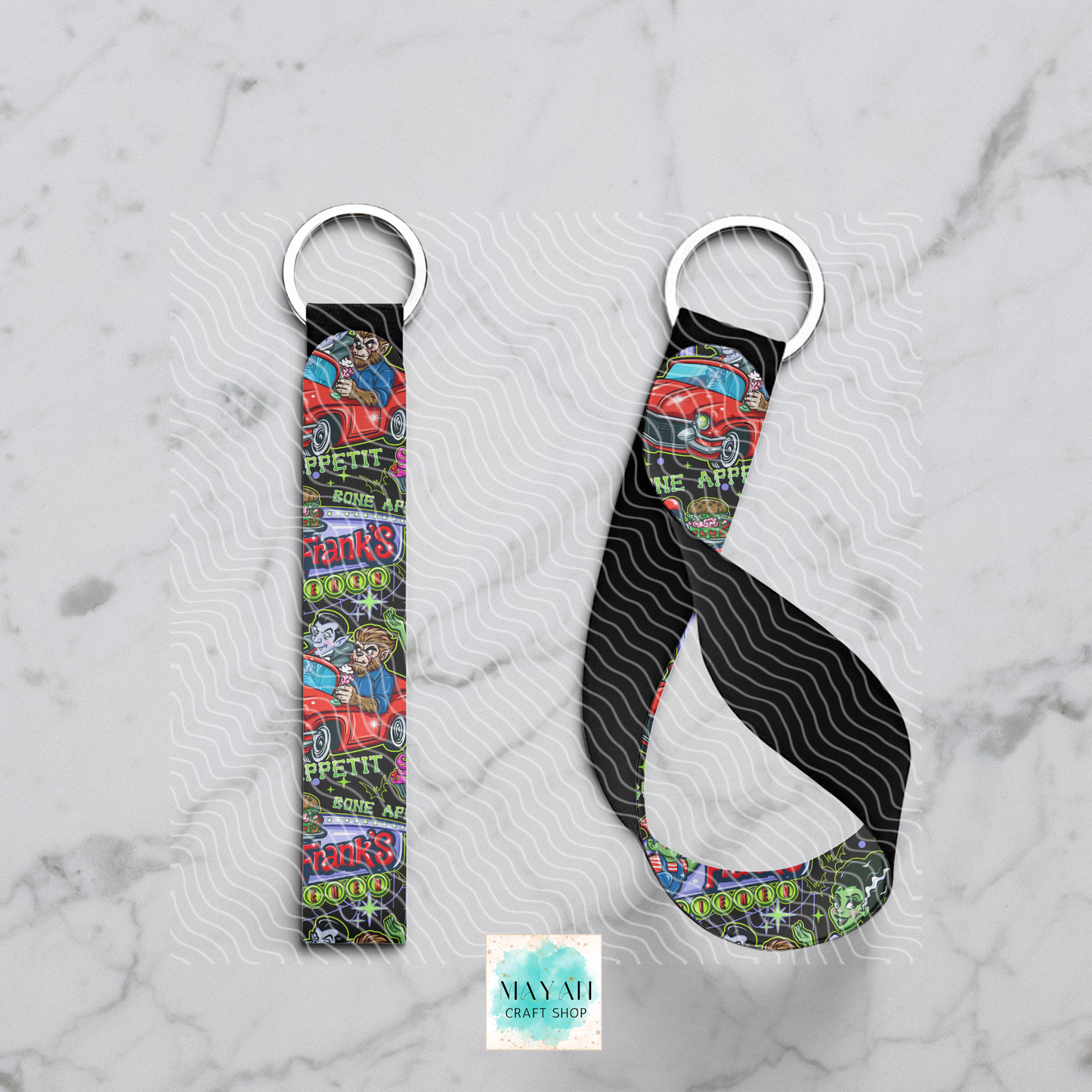 Keychain with colorful design on a gray marble background