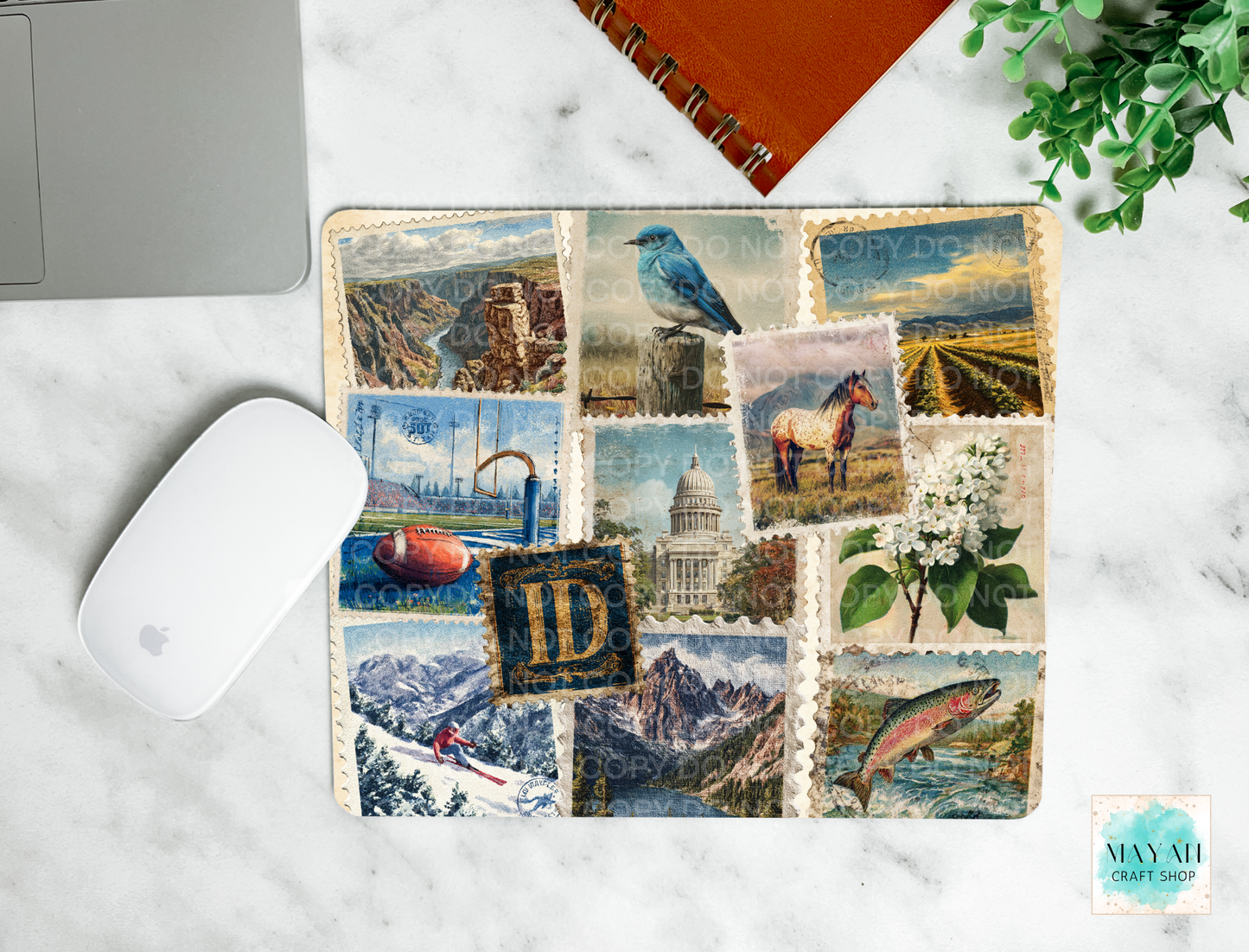 Mouse pad with Idaho-themed collage on a marble surface