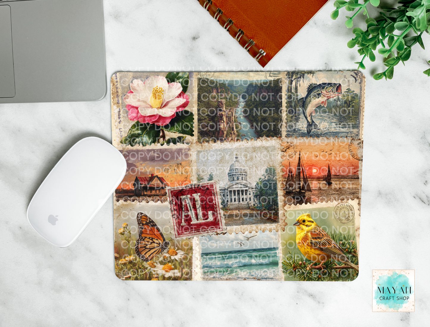 Decorative mouse pad with various designs on a marble surface