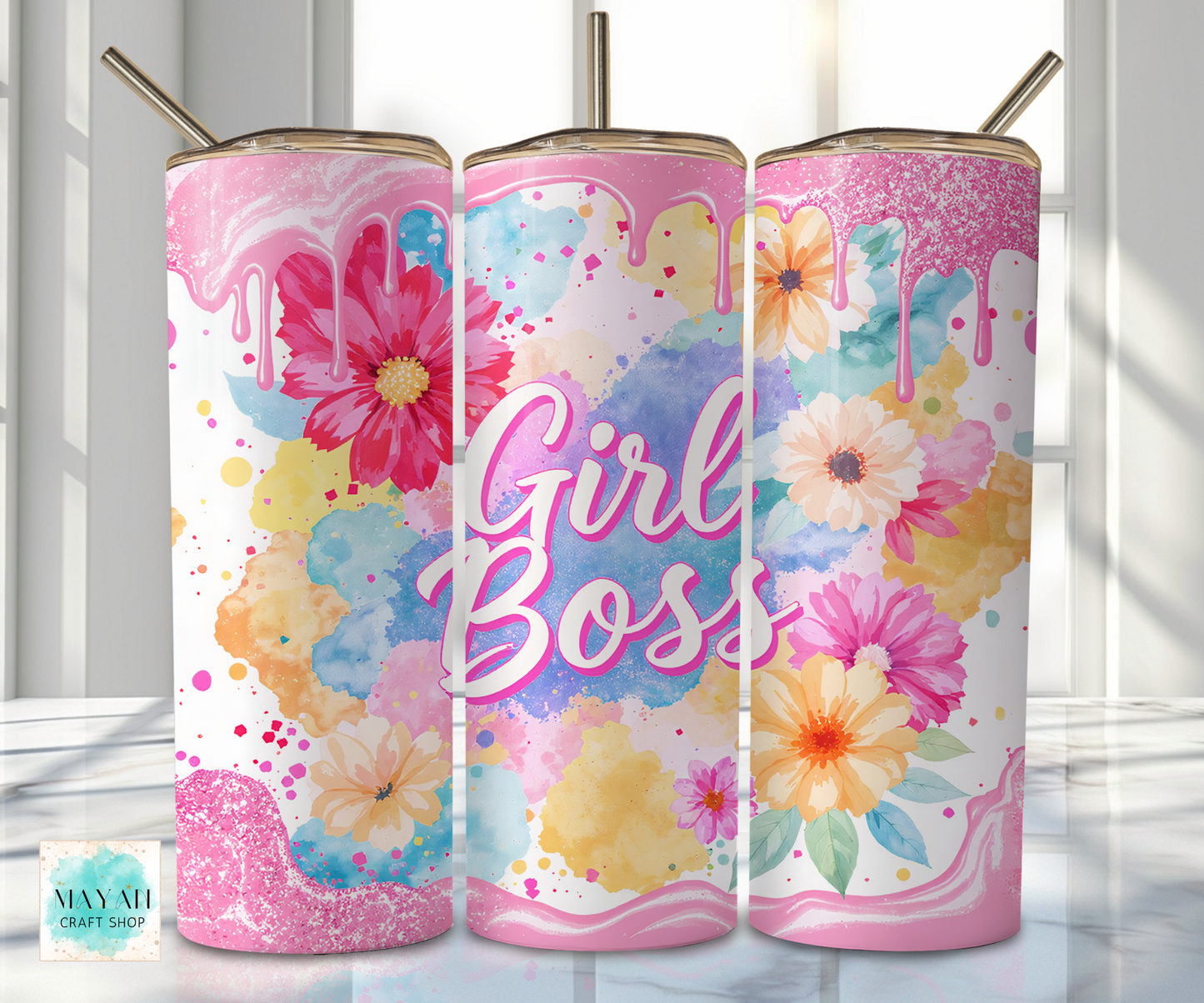 Three floral-themed tumblers with 'Girl Boss' text on a light background
