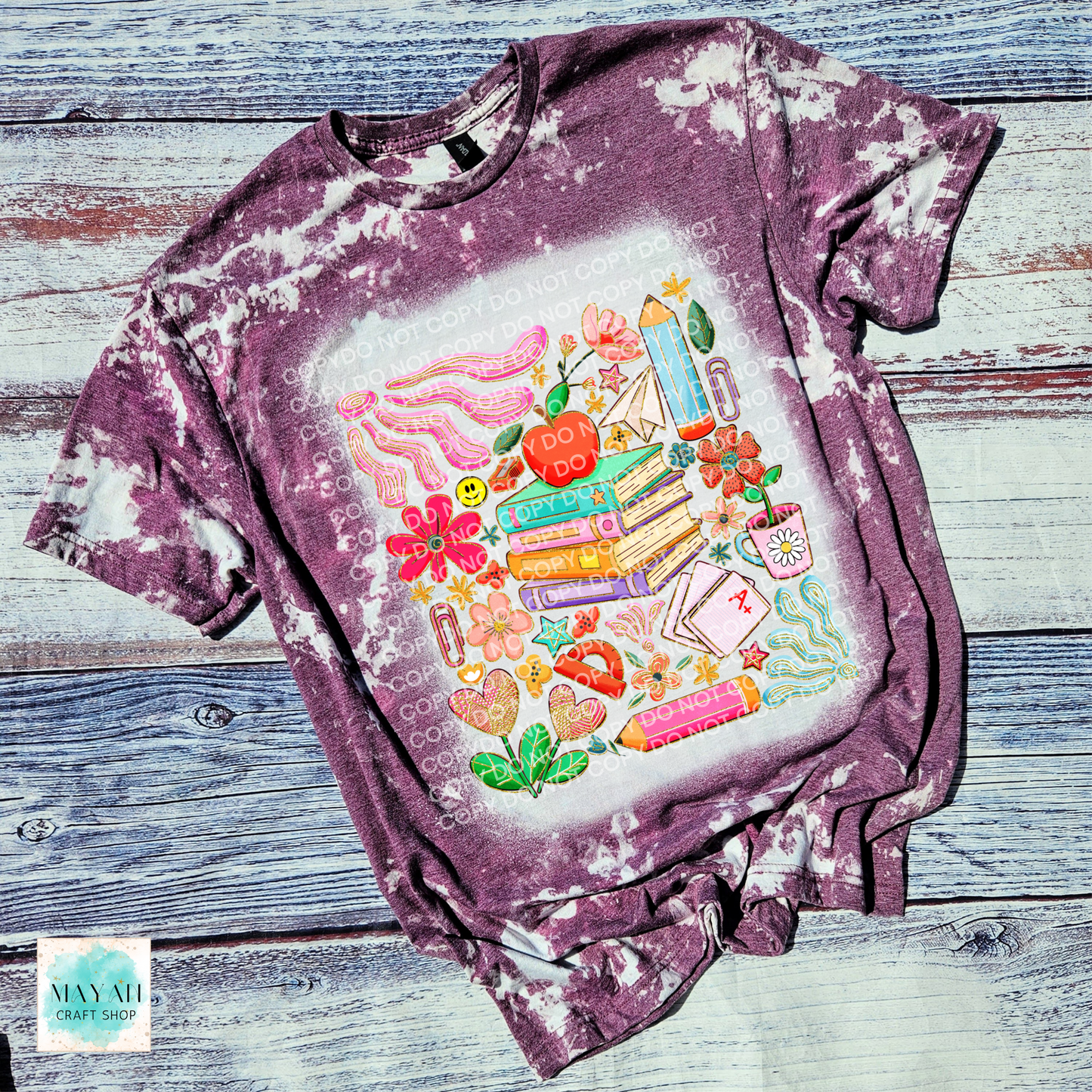 Educator mashup heather maroon scrounged tee. -Mayan Craft Shop