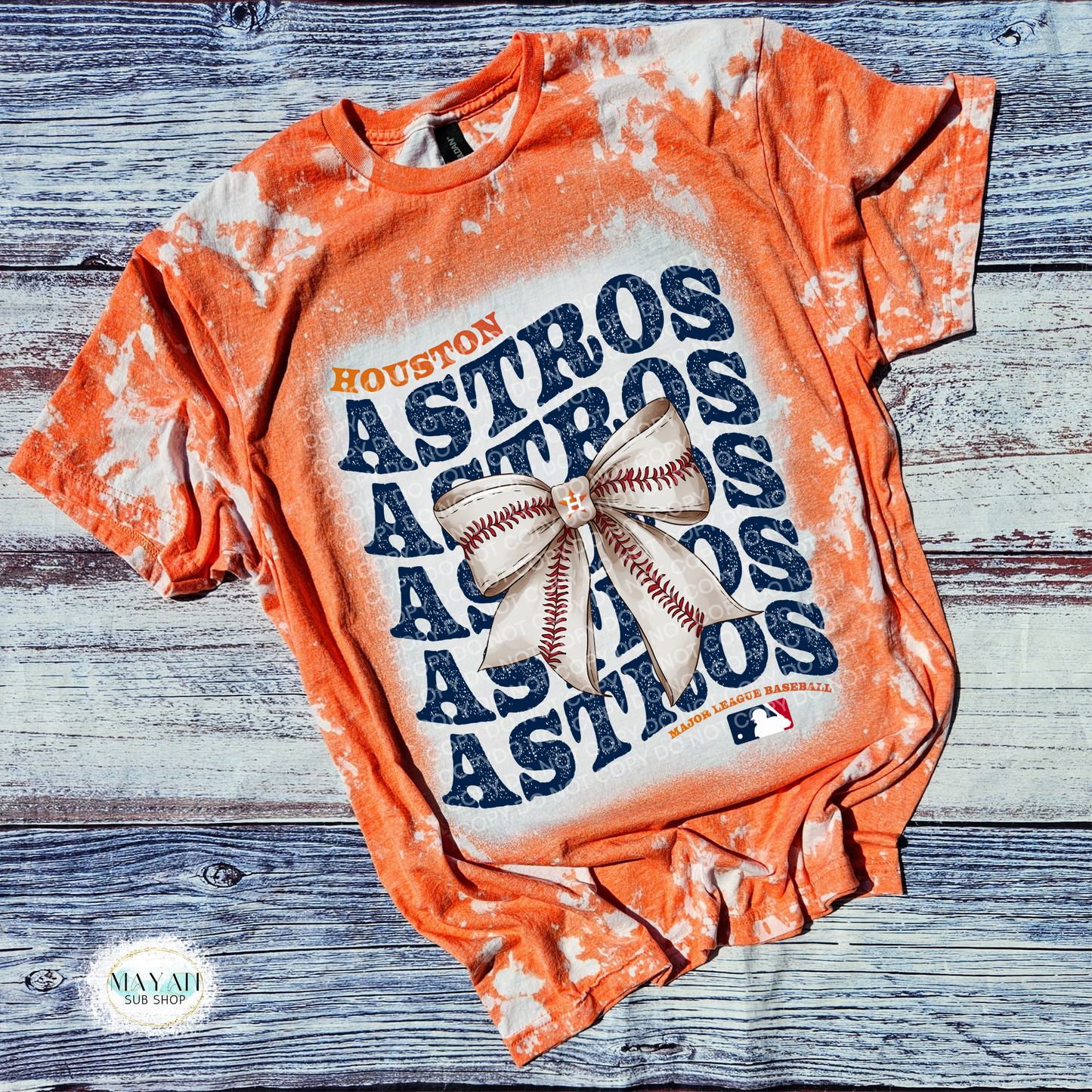 Houston baseball bow heather orange scrounged tee. -Mayan Craft Shop