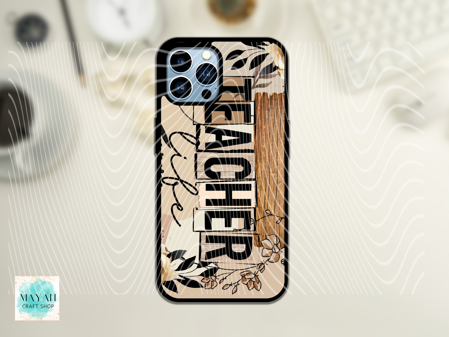 Phone case with 'TEACHER life' text and floral designs on a light background