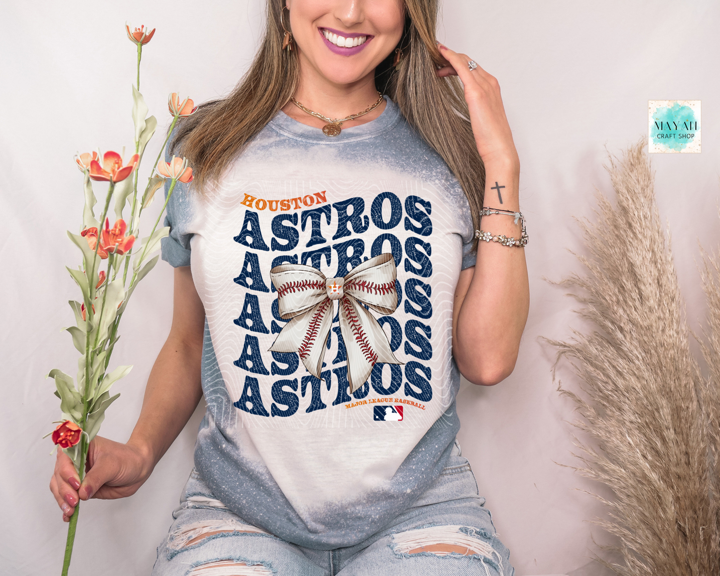 Houston baseball bow heather indigo blue bleached tee. -Mayan Craft Shop