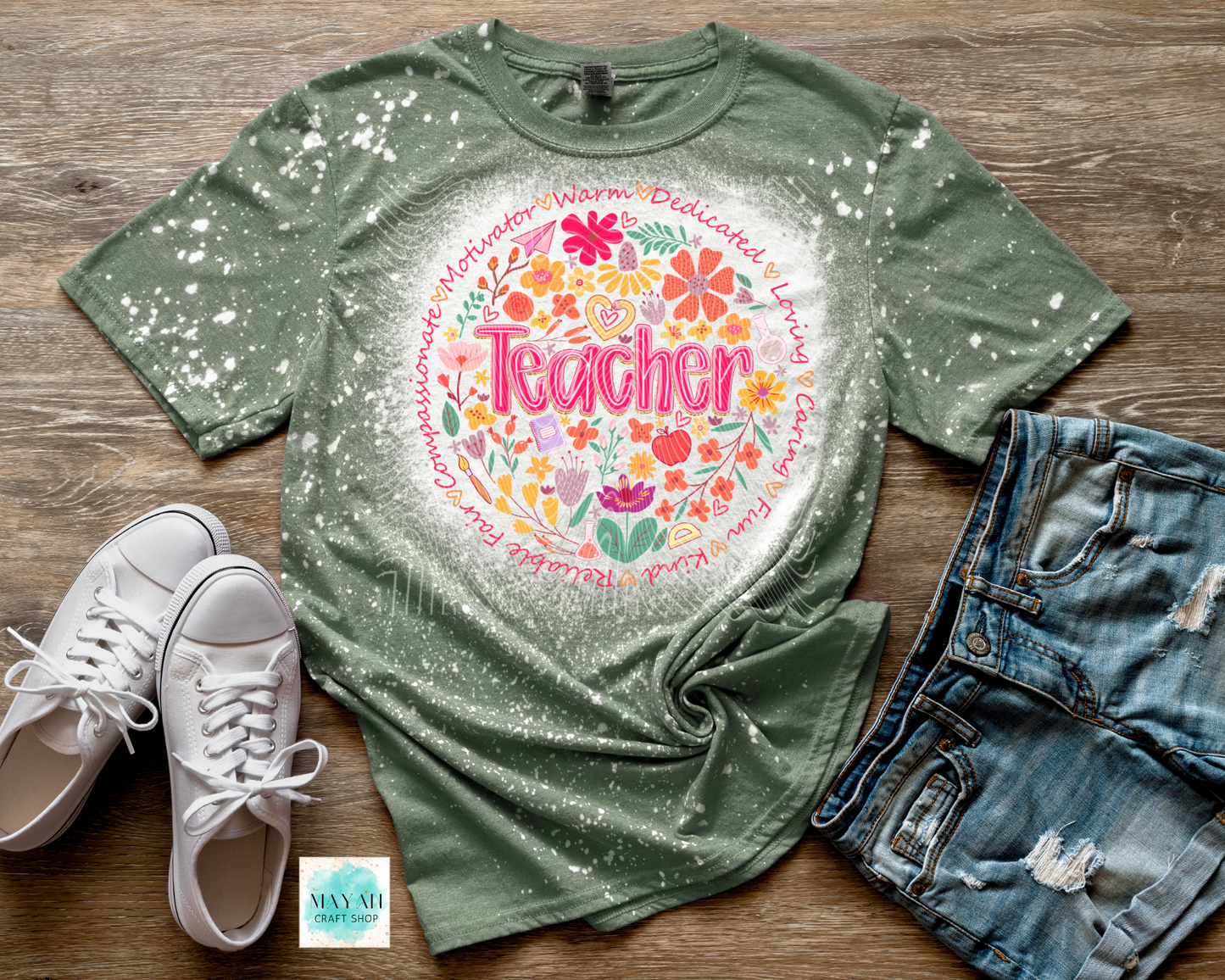 Teacher meaning heather military green bleached tee. -Mayan Craft Shop