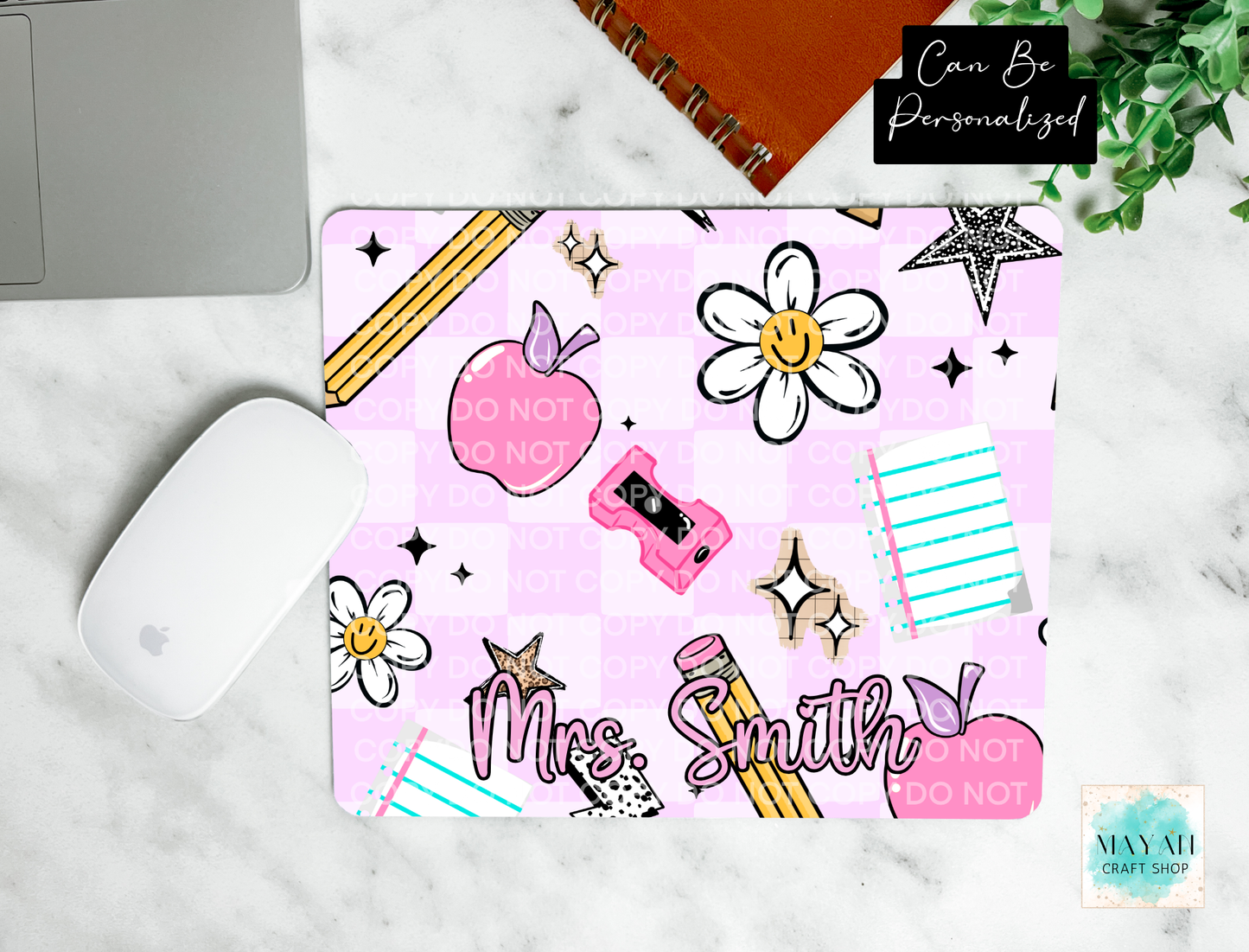 Pink apple checker mouse pad.