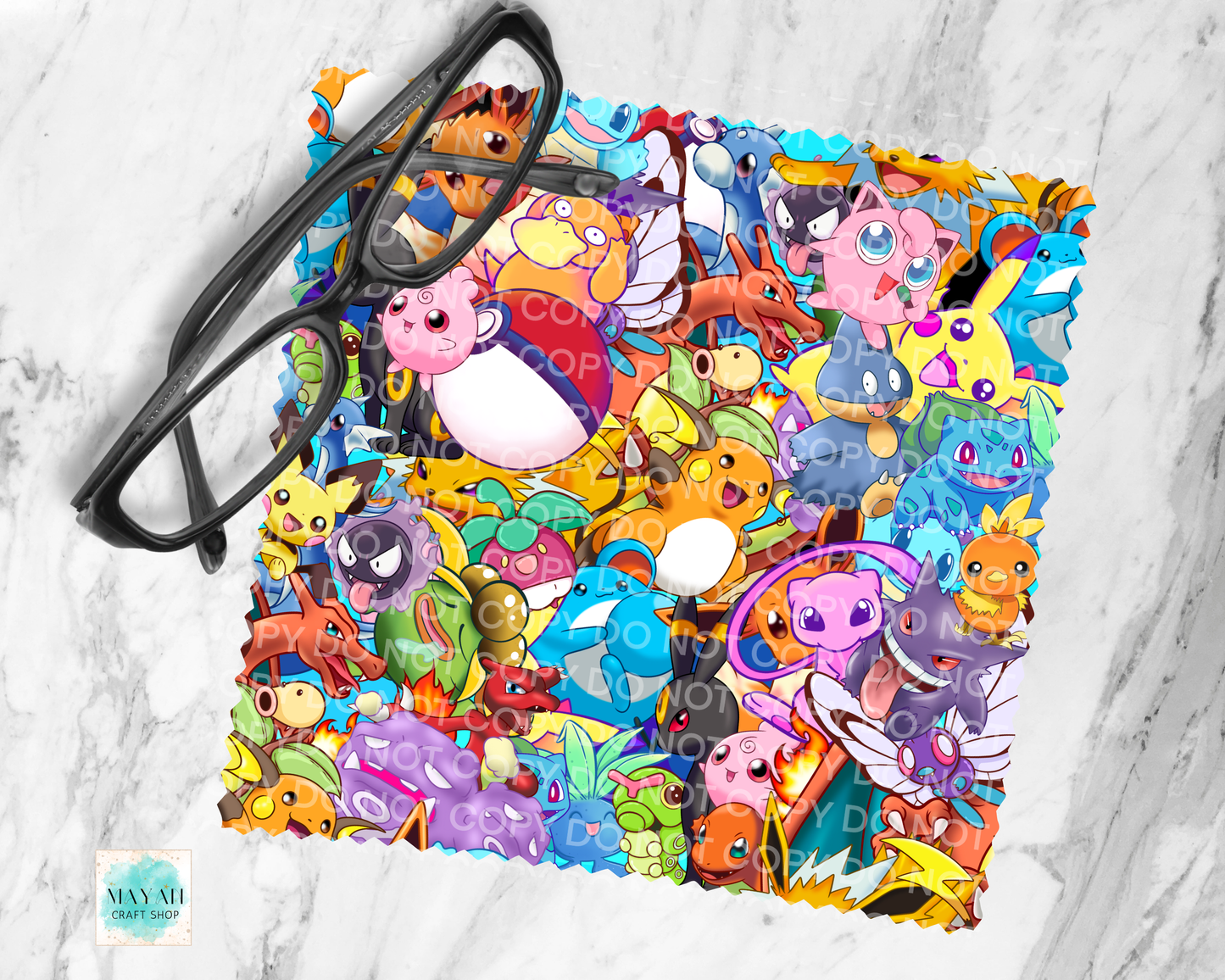 Colorful pouch with cartoon characters and a pair of glasses on a marble background