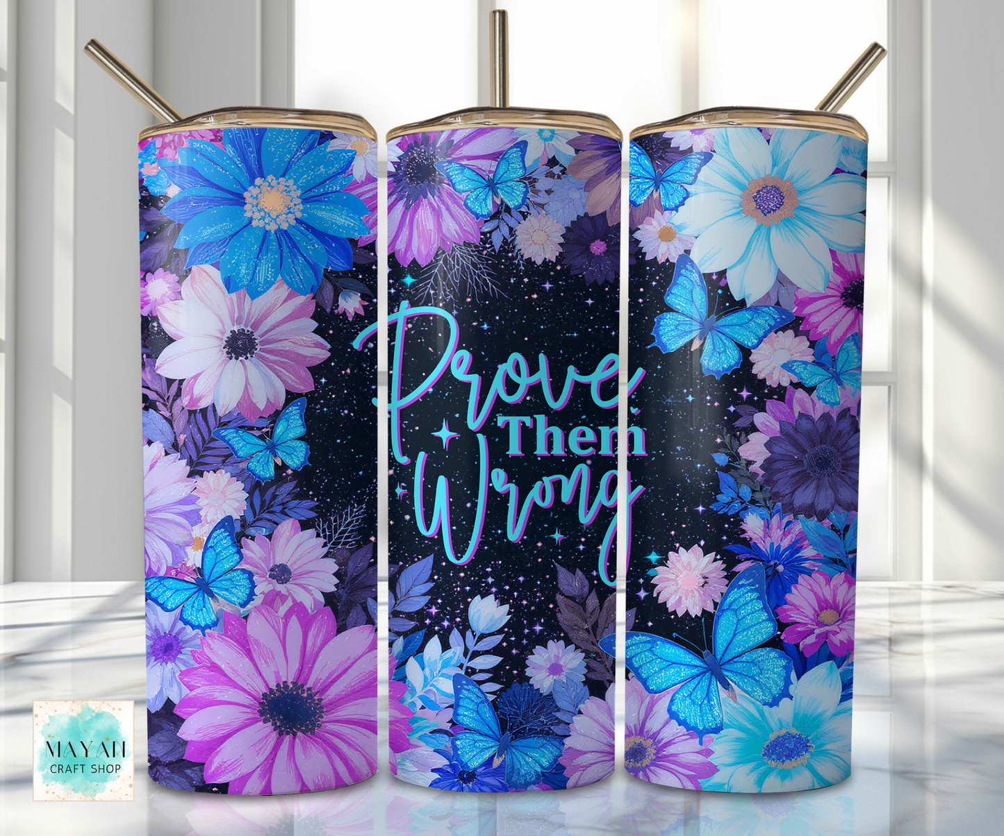 Three tumblers with floral designs and text on a white background