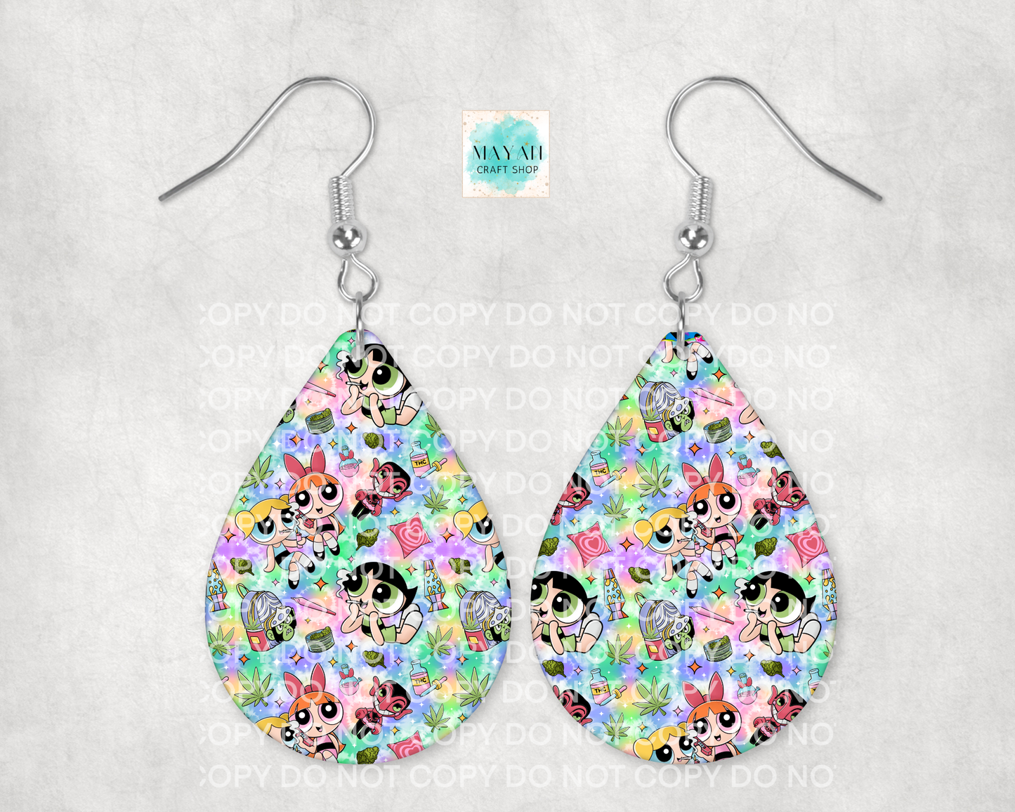 Teardrop-shaped earrings with colorful character pattern on a light gray background