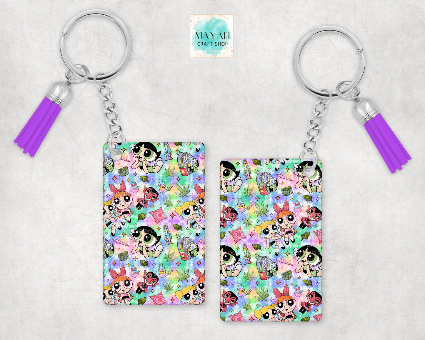 Keychains with cartoon character pattern on a light gray background