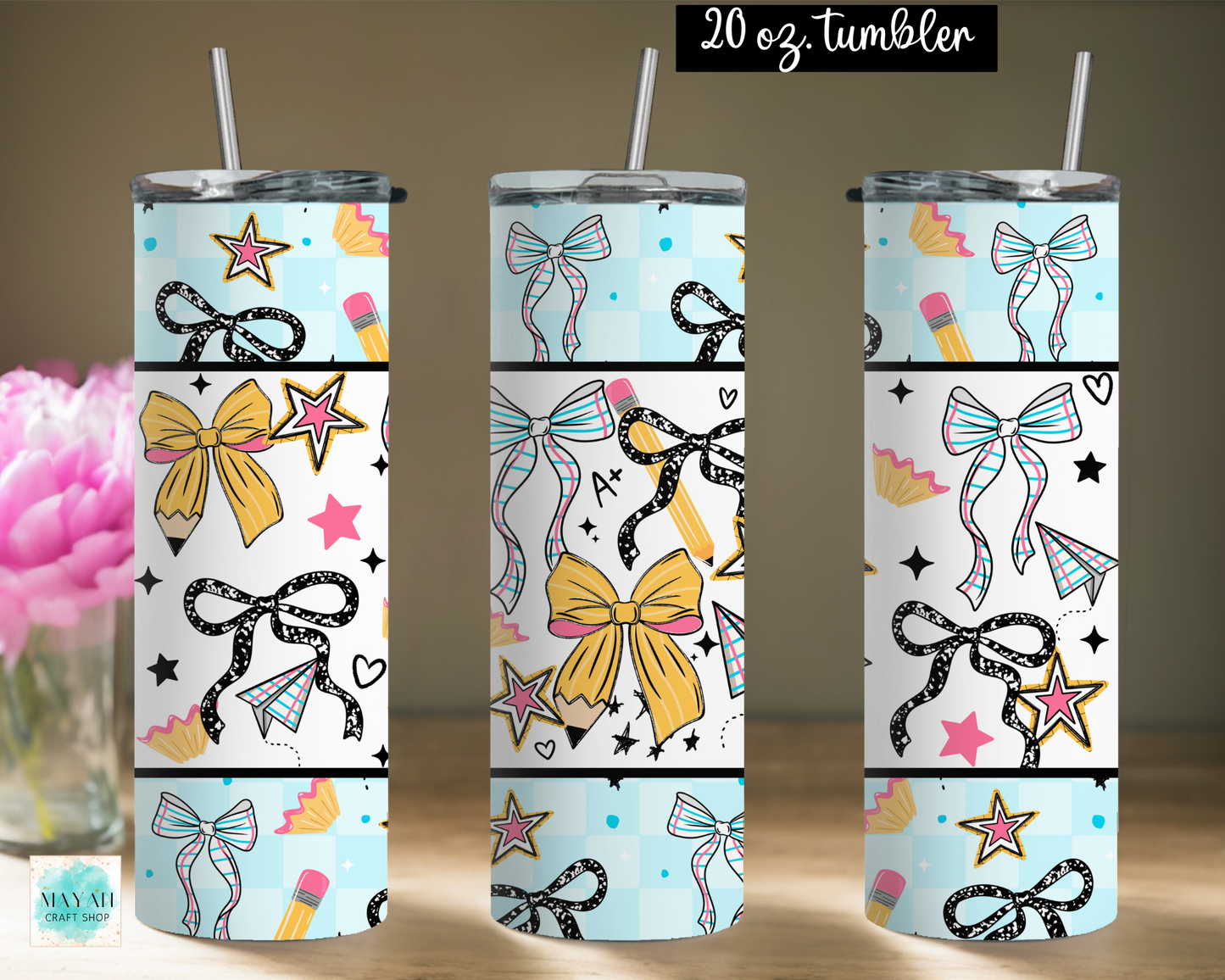 Three views of a 20 oz stainless steel tumbler with a clear straw, featuring a colorful pattern of bows, stars, pencils, and hearts on a light blue and white background.