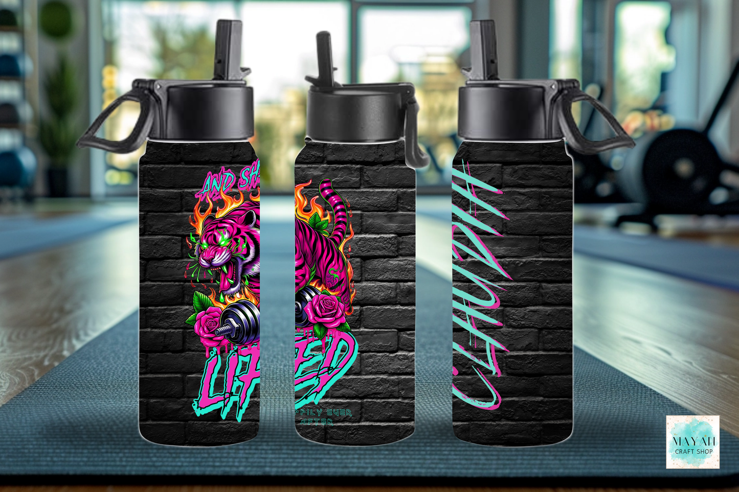 She lifted water bottle. -Mayan Craft Shop