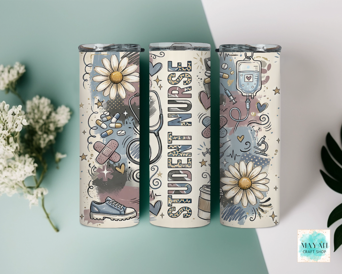 Three tumblers with 'Student Nurse' design on a light blue background