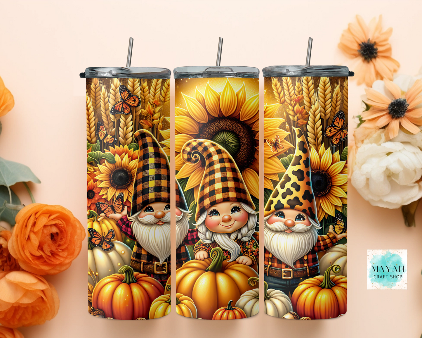 Three tumbler designs featuring gnomes, pumpkins, and sunflowers on a beige background.