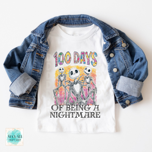 T-shirt with '100 Days of Being a Nightmare' design on a denim jacket