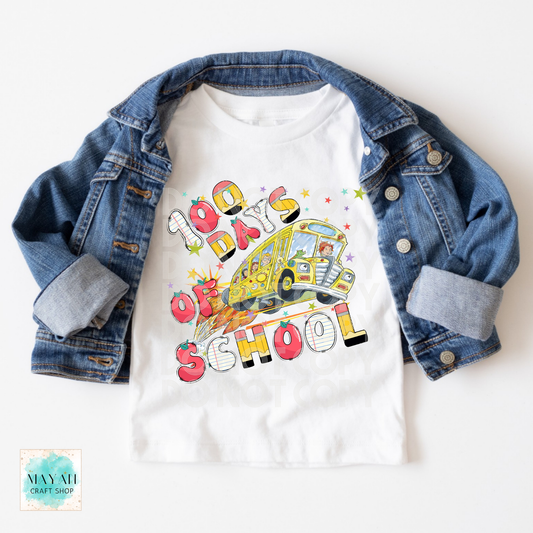 White t-shirt with '100 Days of School' design and denim jacket on a white background