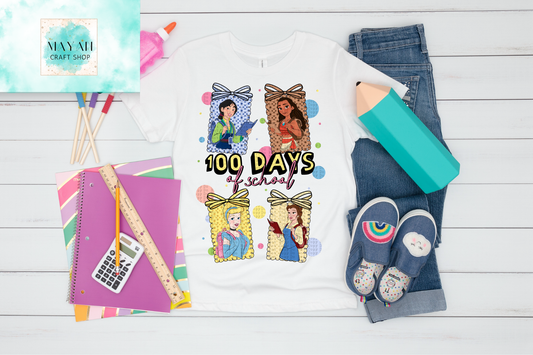 White sweatshirt with '100 Days of School' design, surrounded by school supplies on a wooden surface.