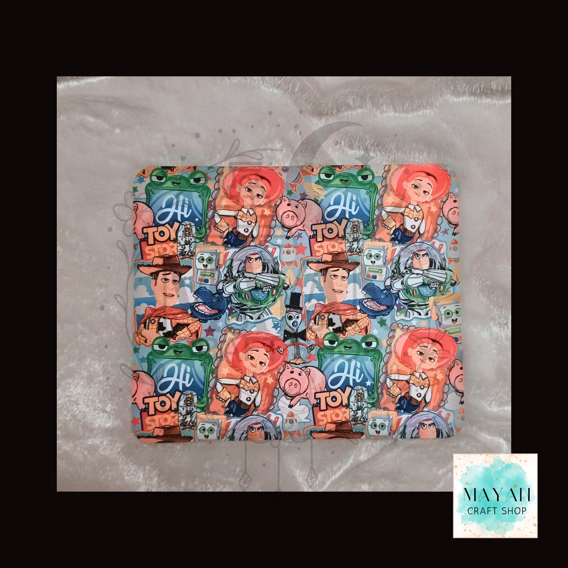 Colorful themed product on a textured surface.