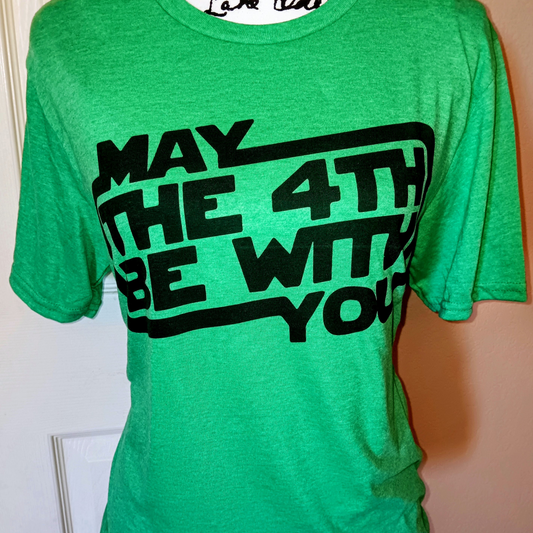 May 4th in heather irish green shirt. -Mayan Craft Shop