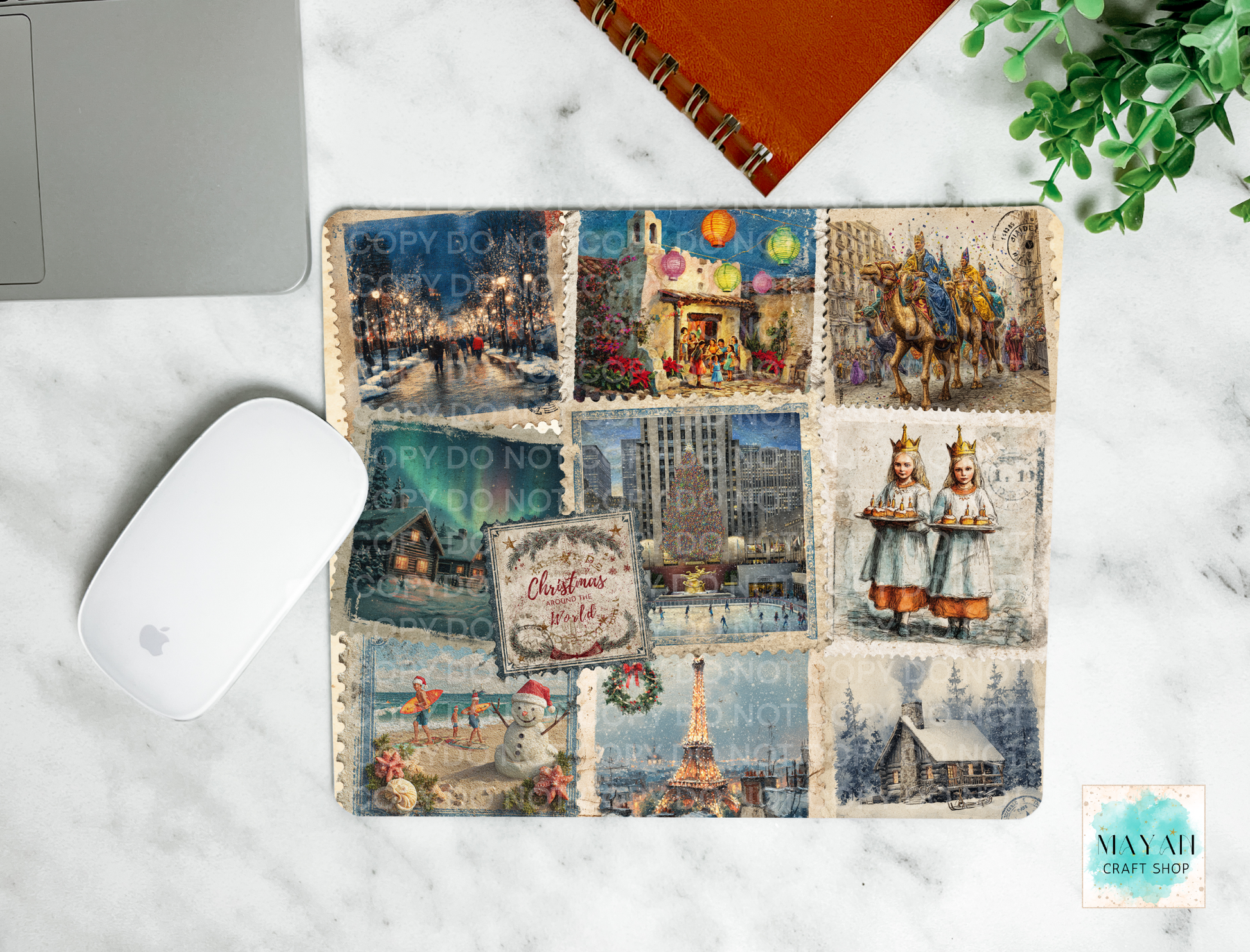 Mouse pad with vintage-themed design on a marble surface with a laptop and mouse.