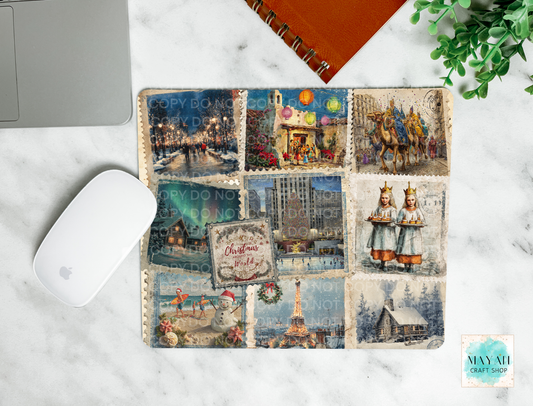 Mouse pad with vintage-themed design on a marble surface with a laptop and mouse.