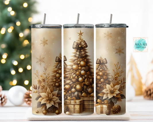 Three Christmas-themed tumblers with tree and gift designs on a decorative stand.