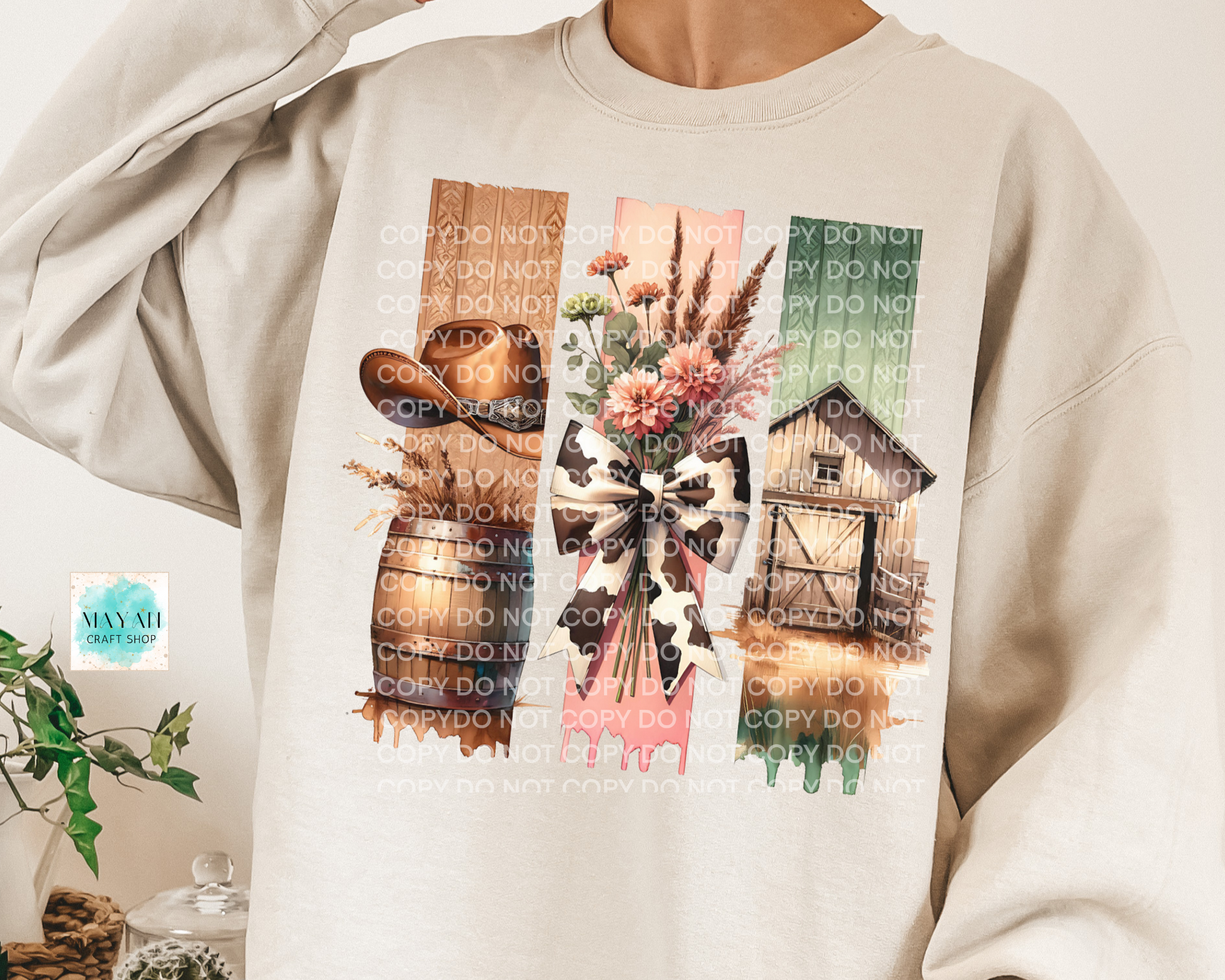 Cow print sand sweatshirt. -Mayan Craft Shop