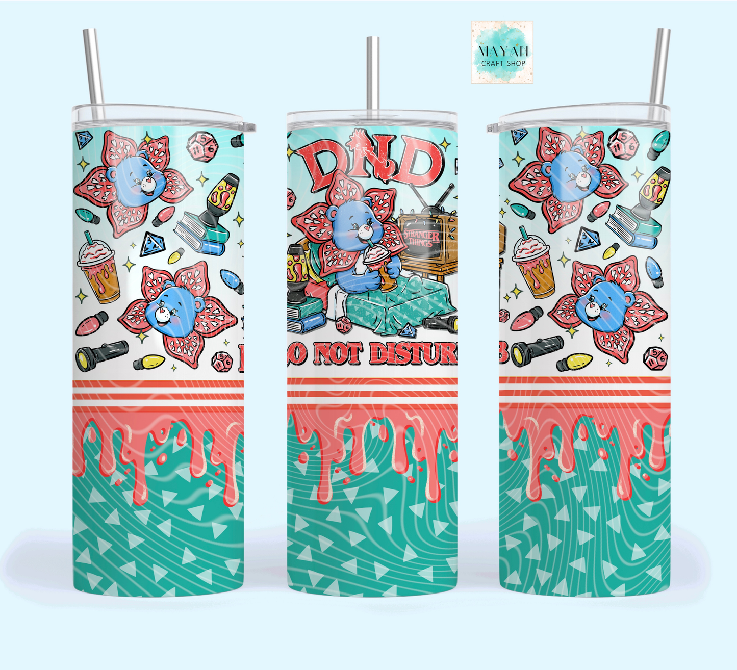 Three colorful tumblers with cartoon bear designs and text on a white background.