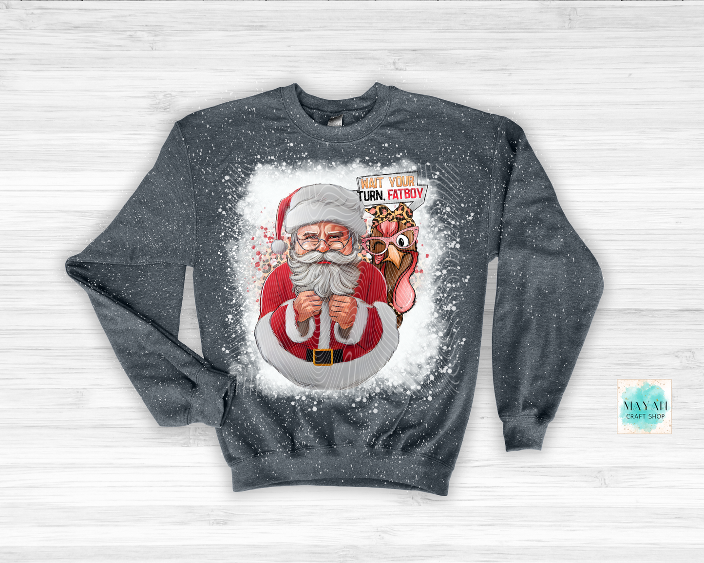 Gray sweatshirt with a graphic of Santa Claus and a dog on a light gray background