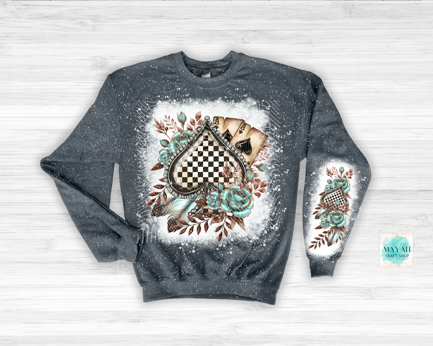 Gray sweatshirt with a decorative design on a white background