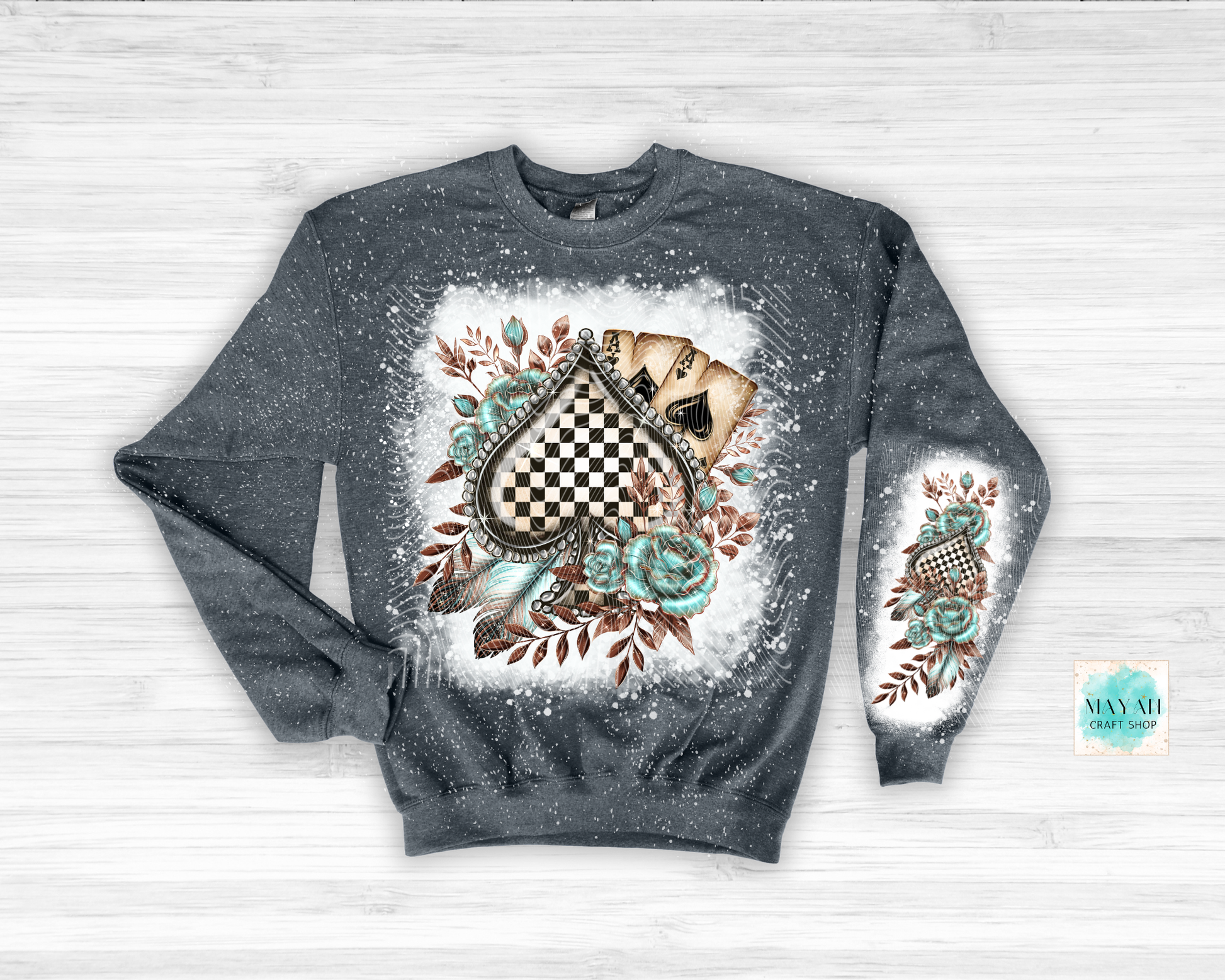 Gray sweatshirt with a decorative design on a white background