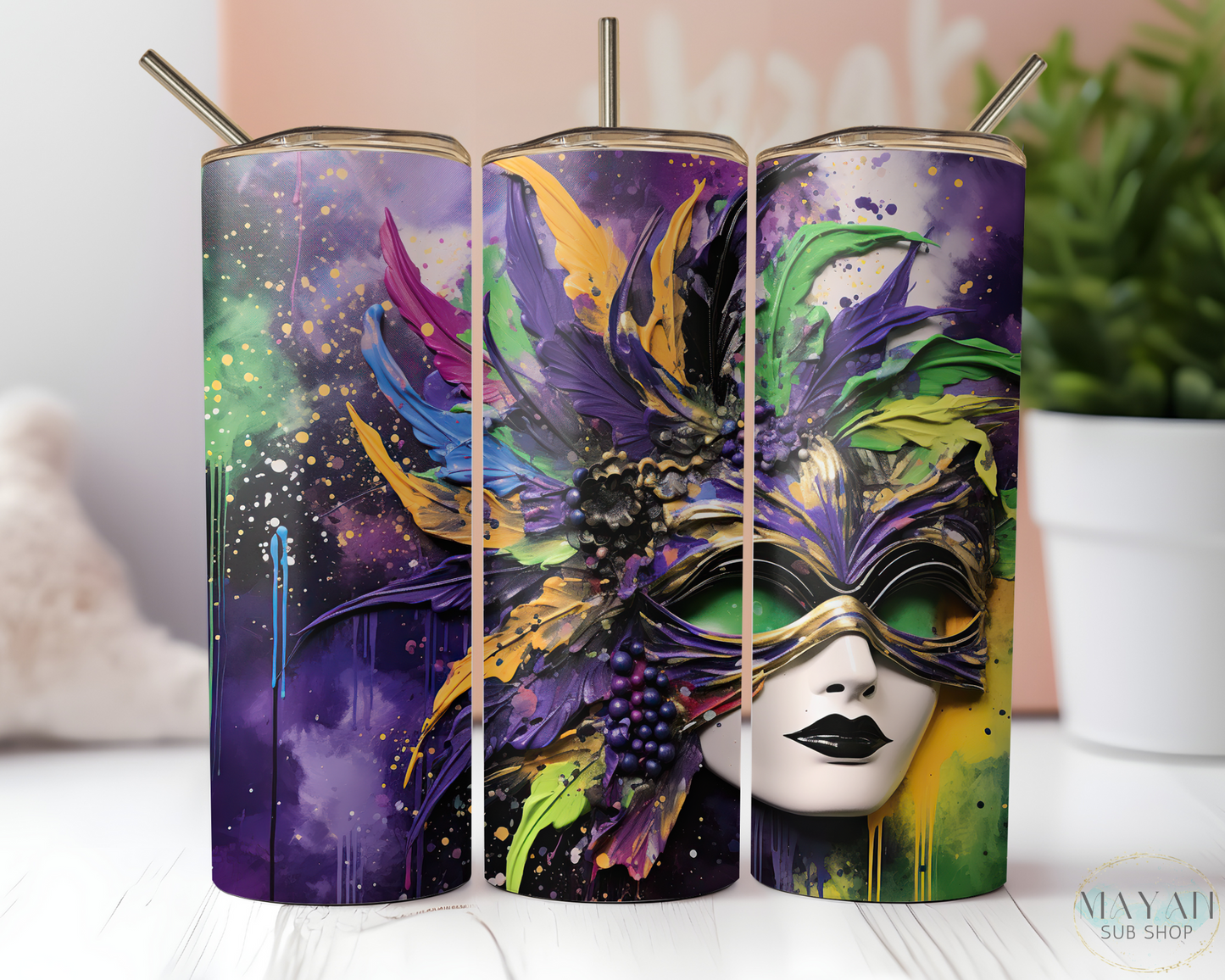 Mardi mask 20 oz. skinny tumbler. -Mayan Sub Shop