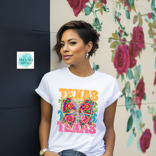 Texas floral bow shirt. -Mayan Craft Shop