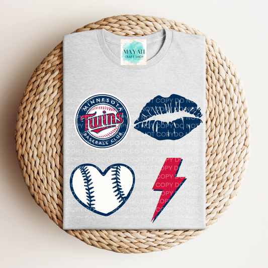 Gray t-shirt with baseball team logo and other graphics on a woven surface