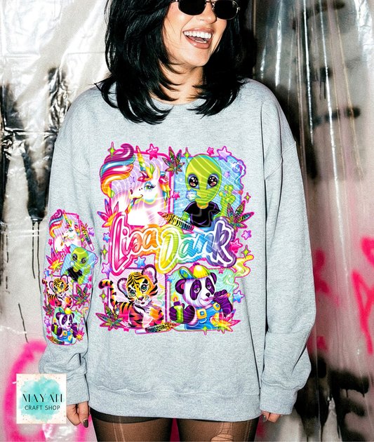 Person wearing a gray sweatshirt with colorful design in an urban setting