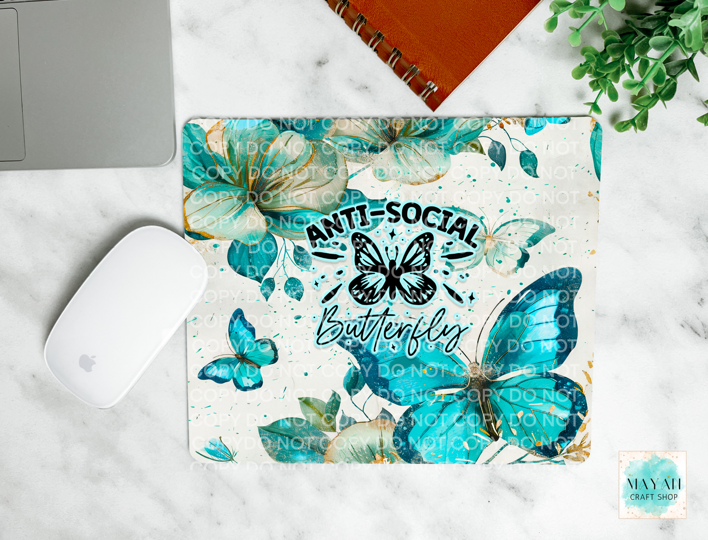 Anti-social butterfly mouse pad.