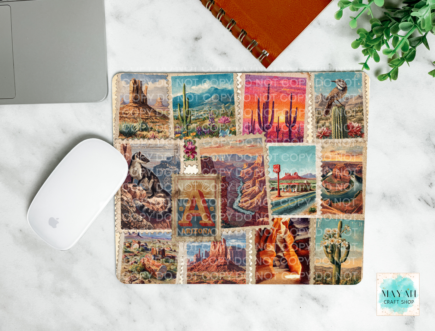 Collage of desert-themed stamps on a wooden surface with a laptop and mouse.