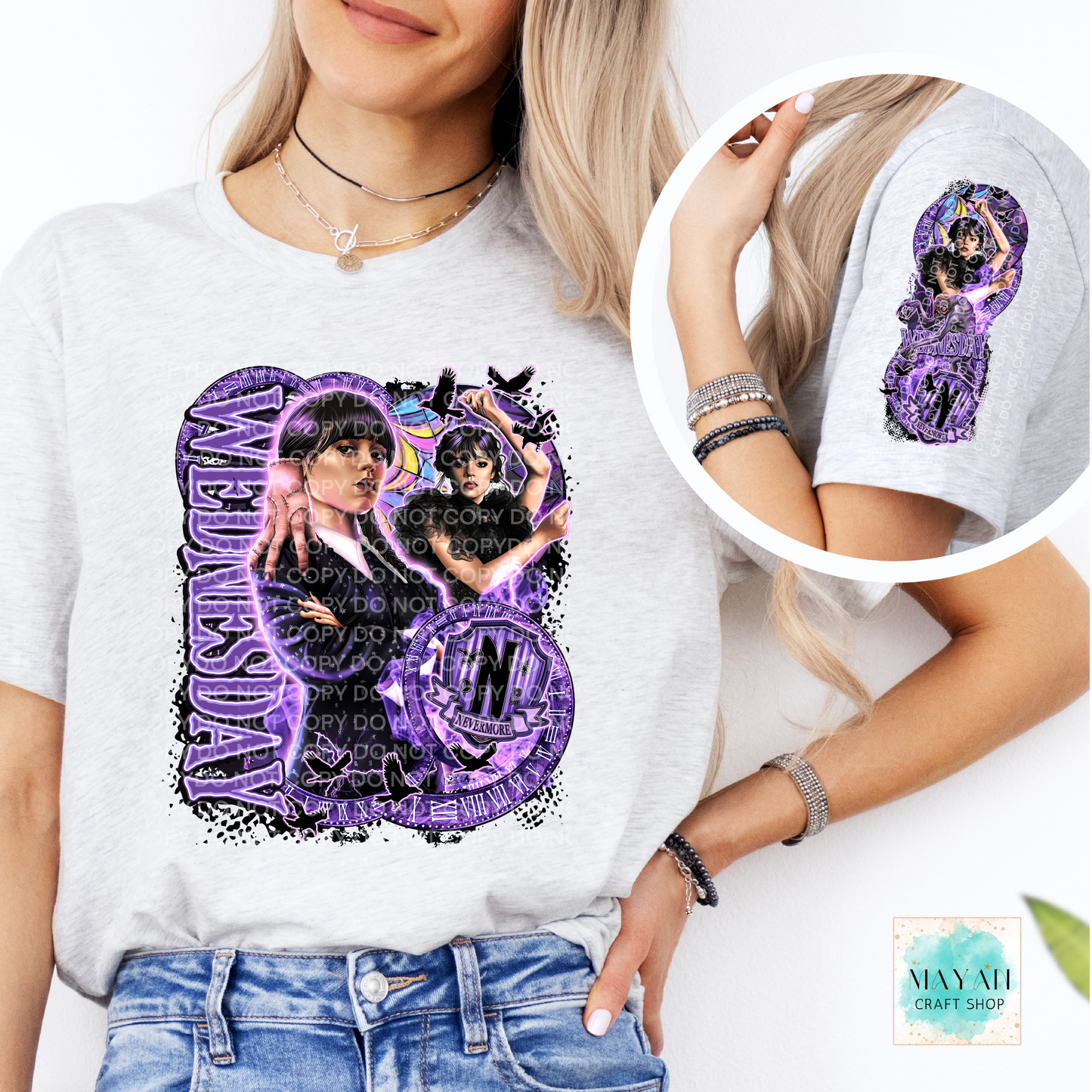 Person wearing a white t-shirt with a graphic design of two people in purple.
