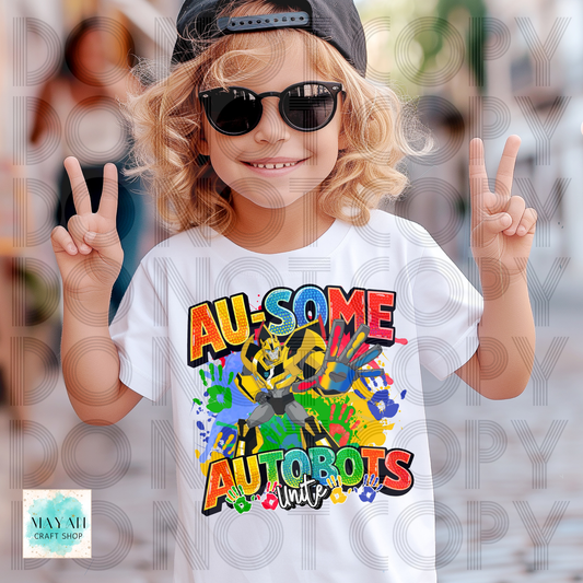 Child wearing a white t-shirt with colorful design, making peace signs.