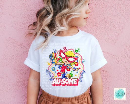 Child wearing a white t-shirt with colorful graphics and text against a pink background