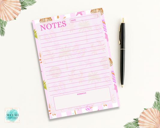 Notepad with 'NOTES' text and a pen on a white background with decorative elements.