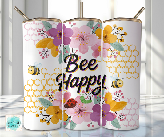Three floral-themed tumblers with 'Bee Happy' text on a white background.
