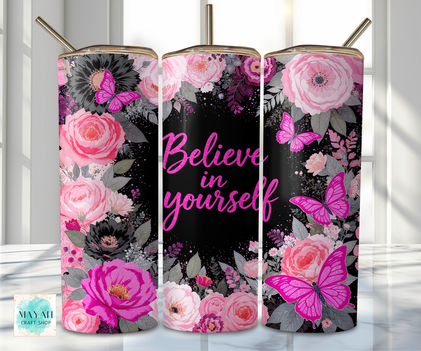Three tumblers with floral and butterfly design and 'Believe in yourself' text.