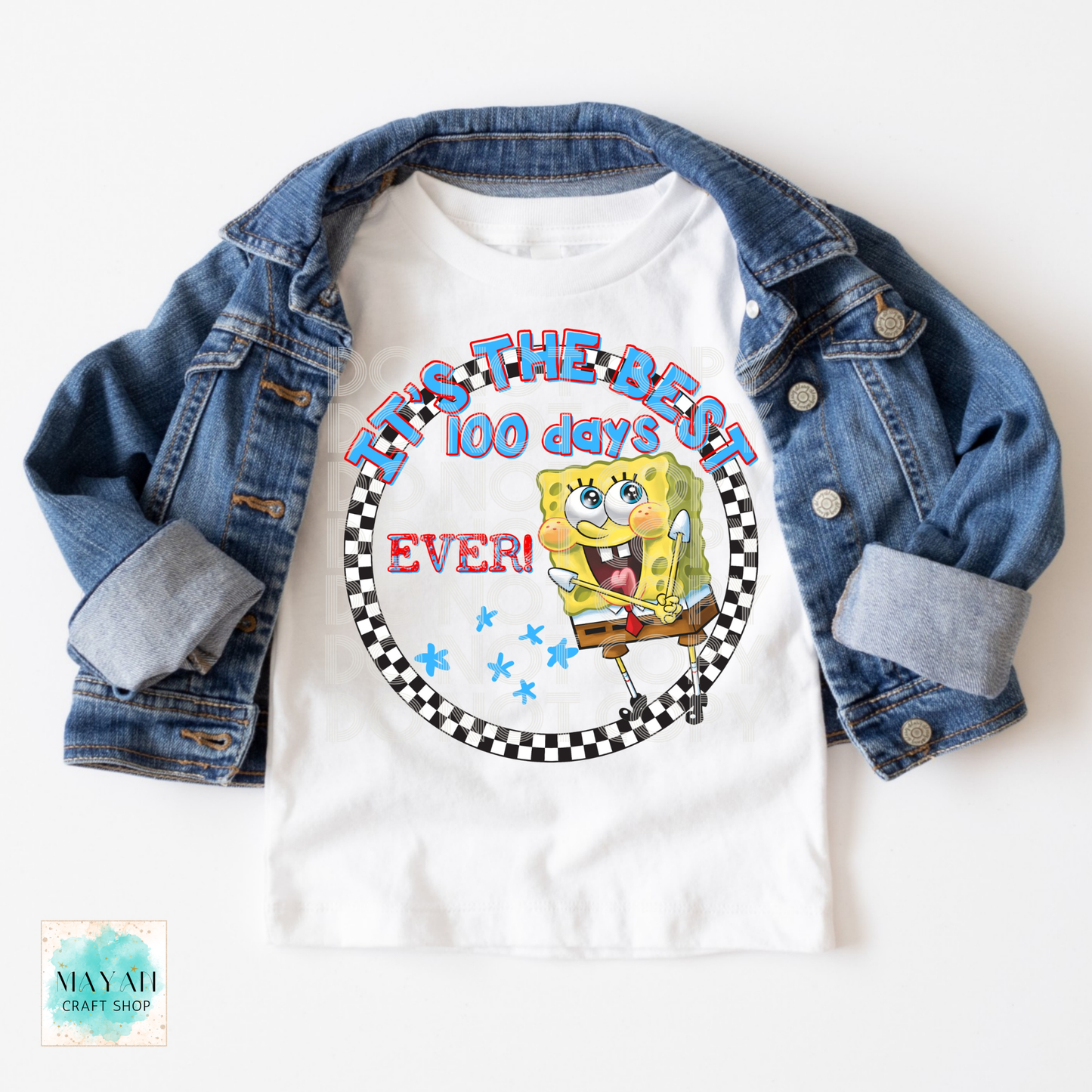 White t-shirt with character graphic and denim jacket on a white background