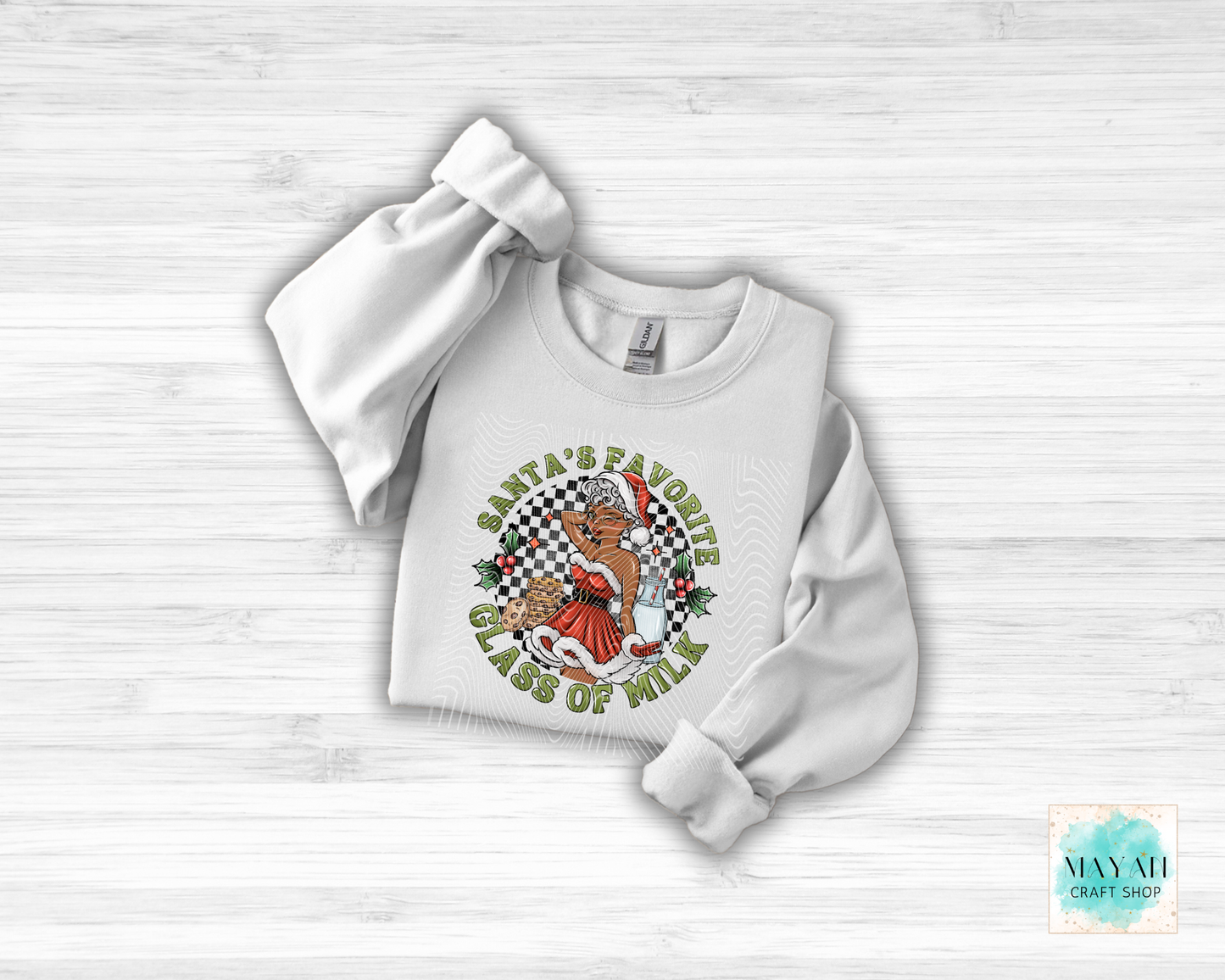 White sweatshirt with a graphic design on a light wooden surface