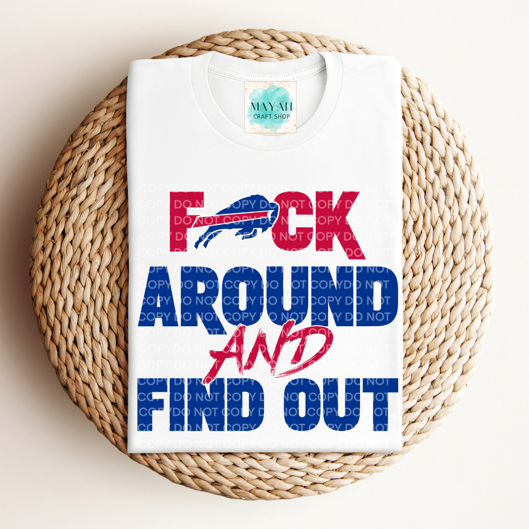 White t-shirt with colorful text and logo on a woven surface