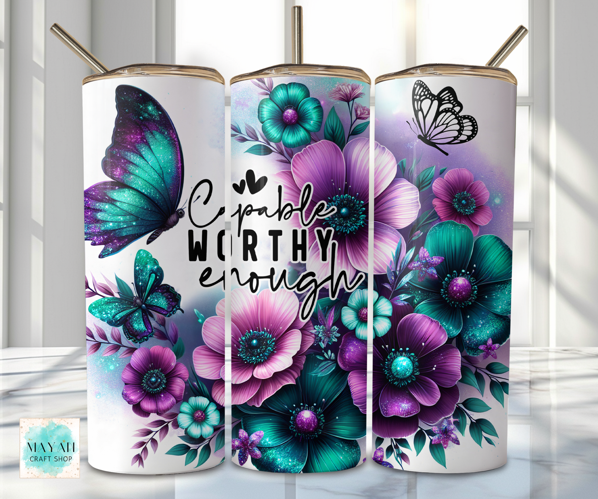 Three tumbler designs with floral and butterfly patterns on a white background.
