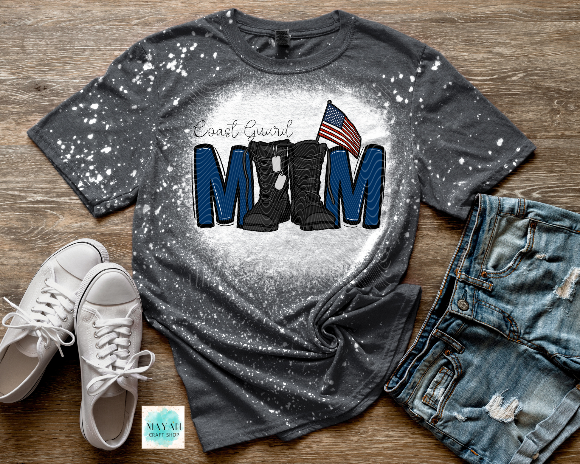 Charcoal t-shirt with military mom design on a wooden surface with shoes and jeans.